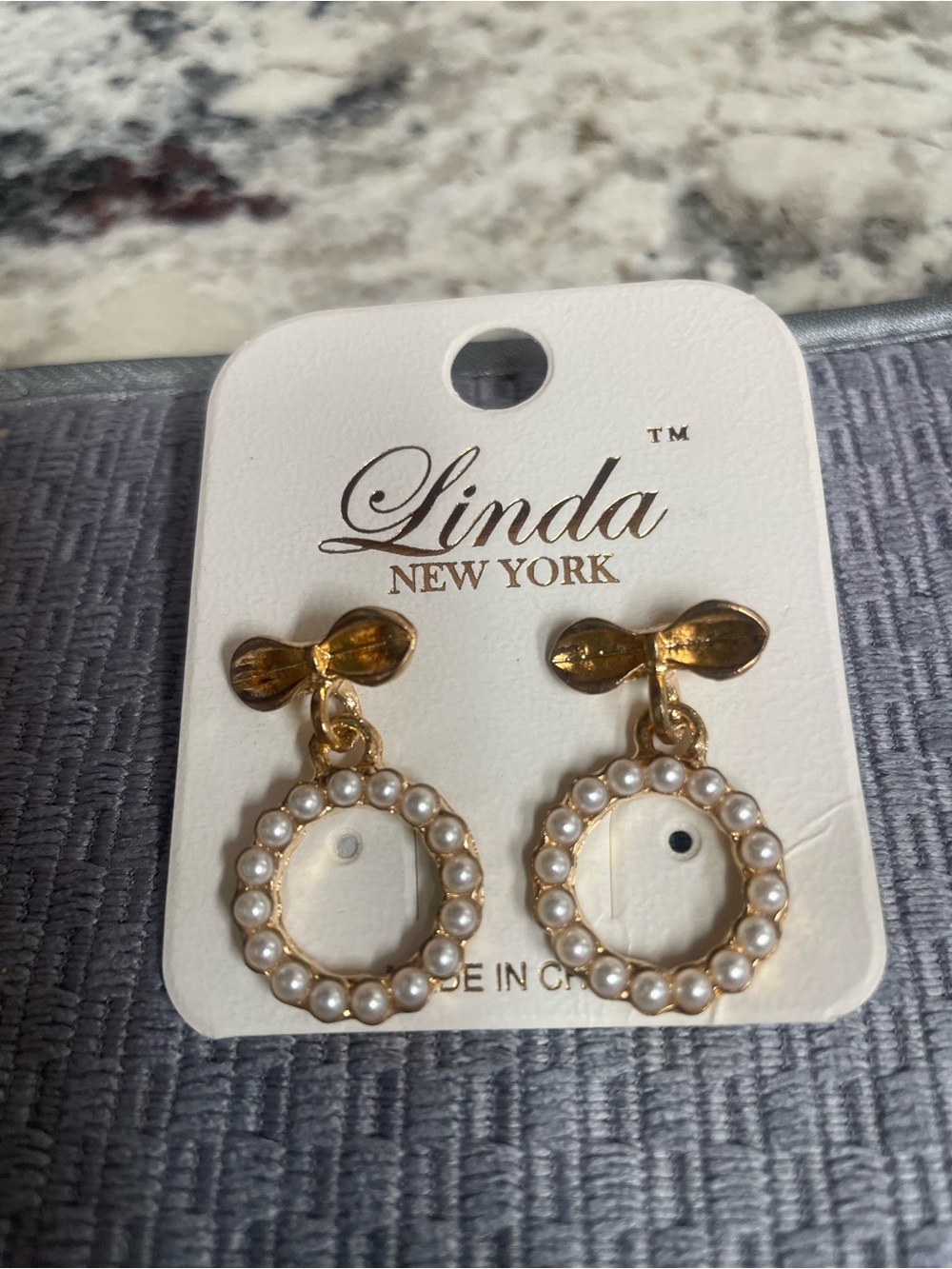 Goldtone  Pearl pierced earrings.